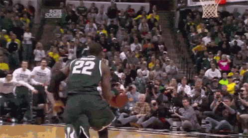 Basketball Player Number 22 Jumping in Air