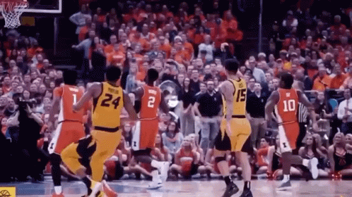 Basketball Player Number 24 Surrounded by Players