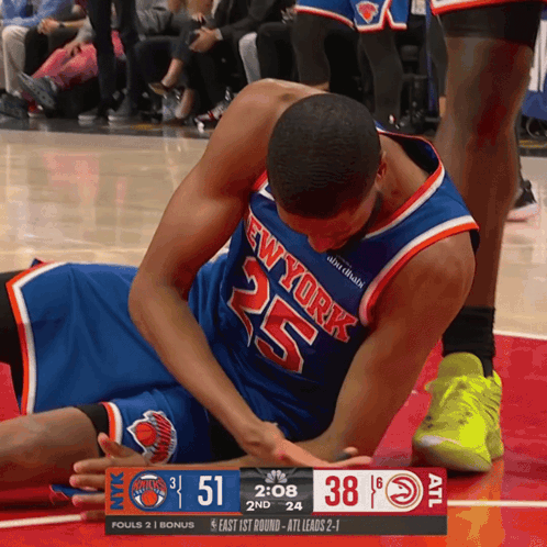Basketball Player Number 25 Lying On Floor GIF