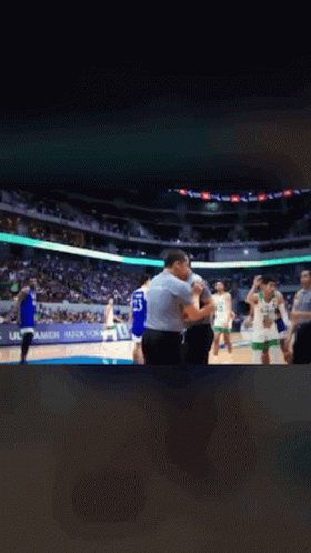 Basketball Player Number 30 Congratulated by Teammates