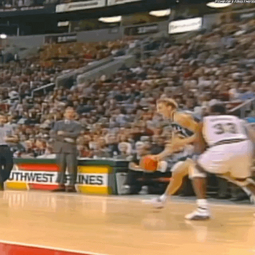 Basketball Player Number 33 Dribbling Ball