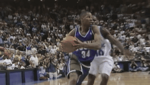 Basketball Player Number 34 Dribbling