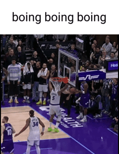 Basketball Player Number 34 Dunking
