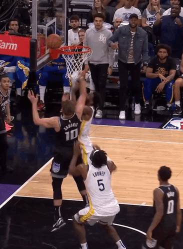 Basketball Player Number 5 Blocking Shot