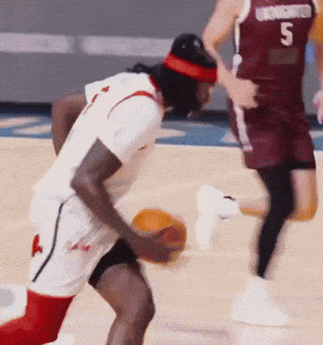 Basketball Player Number 5 Dribbling Ball