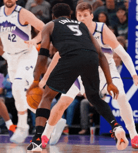 Basketball Player Number 5 Dribbling