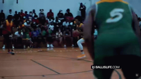 Basketball Player Number 5 Dribbling