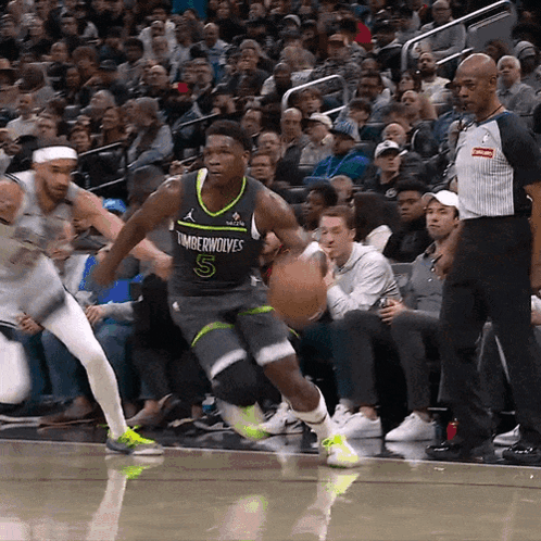 Basketball Player Number 5 Dribbling