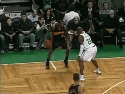 Basketball Player Number 52 Dribbling