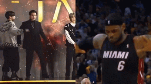 Basketball Player Number 6 Standing Next To Group GIF