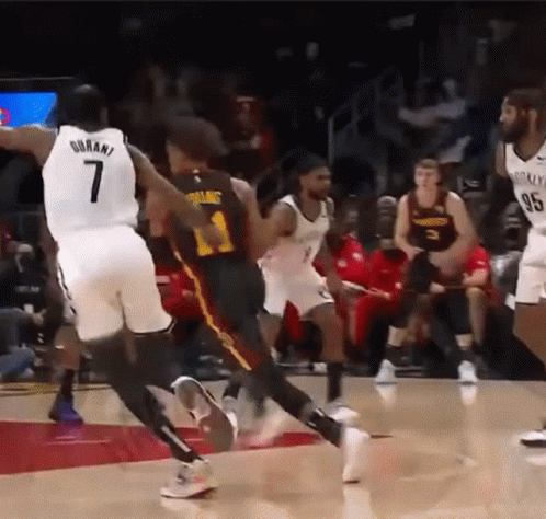 Basketball Player Number 7 Jumping Over GIF