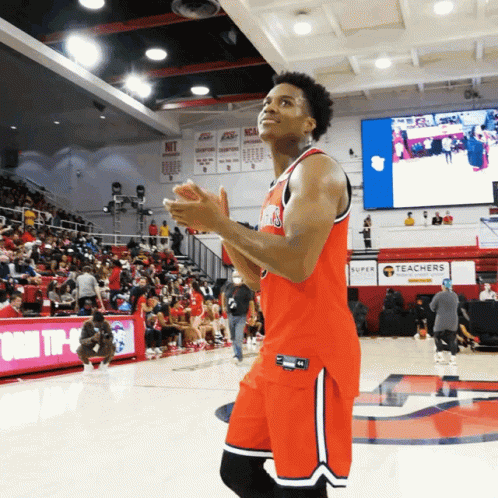 Basketball Player On Court In Front Of Teachers Sign GIF