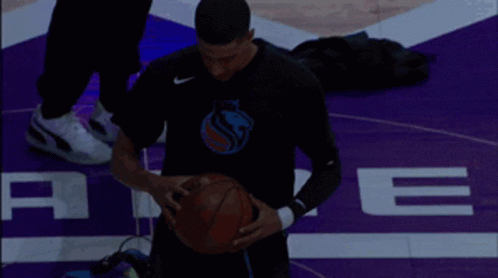 Basketball Player On Purple Court GIF