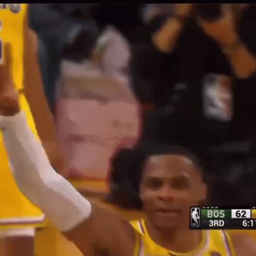Basketball Player Raising Hand While Playing GIF