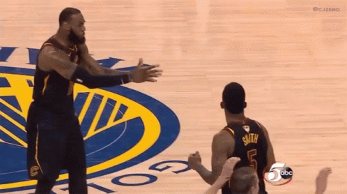 Basketball Player Raising Hands