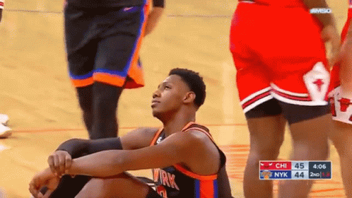 Basketball Player Sitting During Game GIF