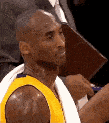 Basketball Player Sitting in Stands