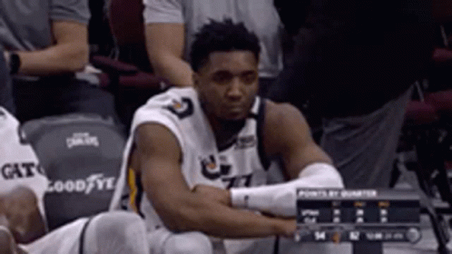 Basketball Player Sitting In Stands GIF