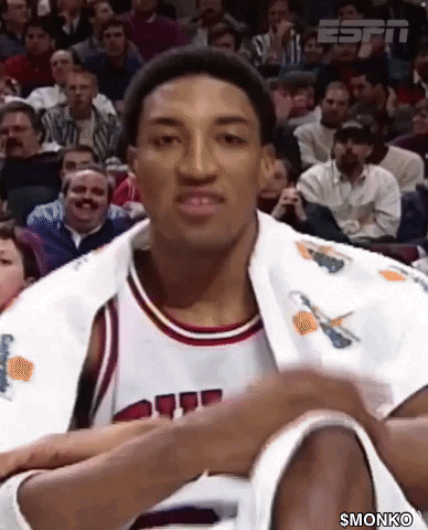 Basketball Player Sitting In White Jacket With Basketball GIF