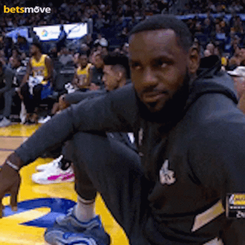 Basketball Player Squatting With Betsmove Logo GIF