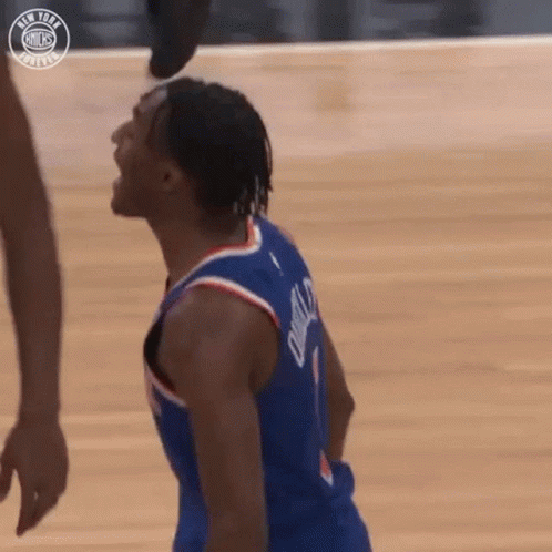 Basketball Player Standing Head Down