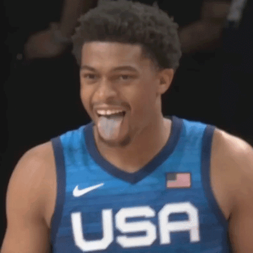 Basketball Player Sticking Tongue Out In Blue USA Jersey GIF