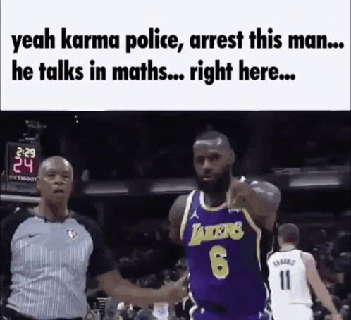Basketball Player Talking to Referee in Lakers Jersey