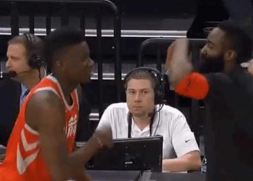 Basketball Player Talking To Referee With Man In Headset GIF