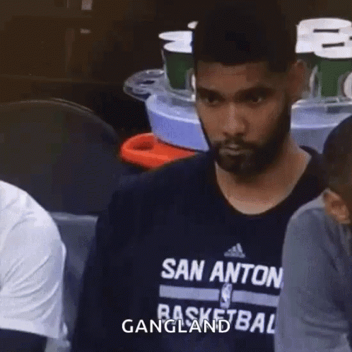 Basketball Player Tim Duncan Sitting