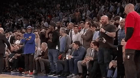 Basketball Player Watching Game With Crowd GIF