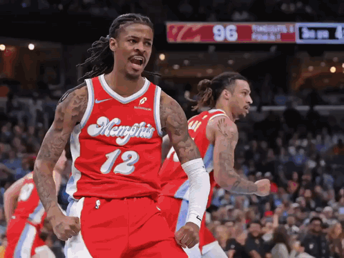 Basketball Player Wearing A Red Jersey With The Number 12 GIF