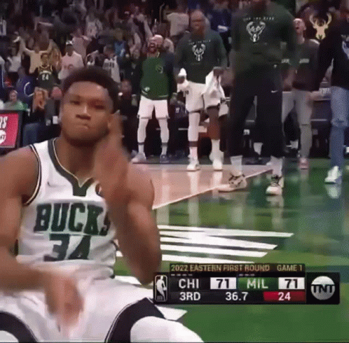 Basketball Player Wearing Buck 34 Jersey