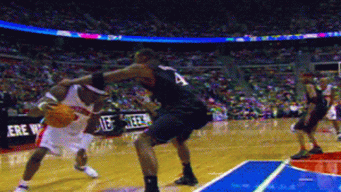 Basketball Player Wearing Number 4 Blocking GIF