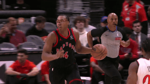 Basketball Player Wearing Raptors Jersey GIF