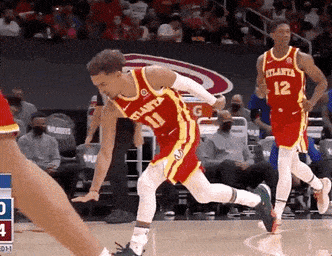 Basketball Player Wearing Red Jersey Number 11