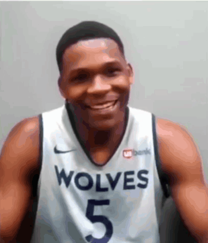 Basketball Player Wearing Wolves Jersey
