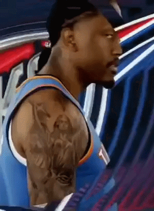 Basketball Player With Arm Tattoo