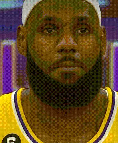 Basketball Player with Beard in Yellow Jersey