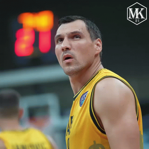 Basketball Player With Scoreboard Saying MK 21