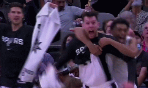 Basketball Players Celebrating Win