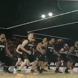 Basketball Players Dancing on Court
