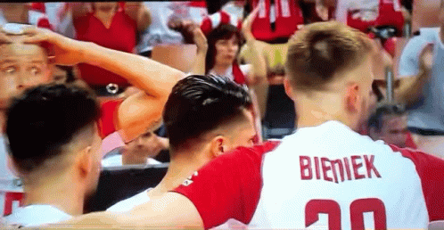 Basketball Players Hugging Number 20 Jersey