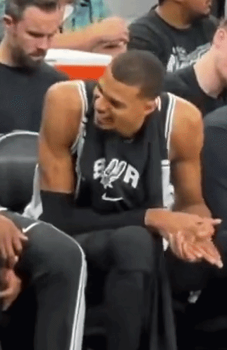 Basketball Players In Front Of Discount Sign GIF