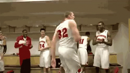 Basketball Players in Locker Room Player Number 32