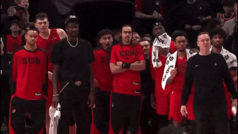 Basketball Players in Red Jerseys Number 23
