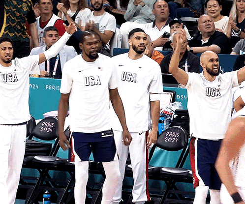 Basketball Players in USA Shirts With Crowd