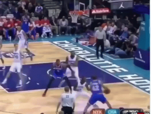 Basketball Players On A Court With A Banner That Says Charlotte On It GIF