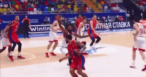Basketball Players on Court with Turkish Airlines Ad