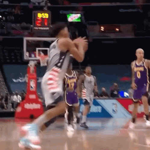 Basketball Players Playing With Scoreboard 21
