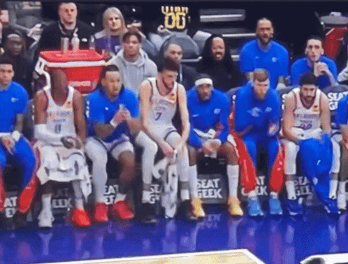Basketball Players Sitting On Bench GIF